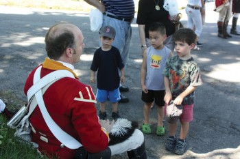 Battle of Brooklyn reenactor and children