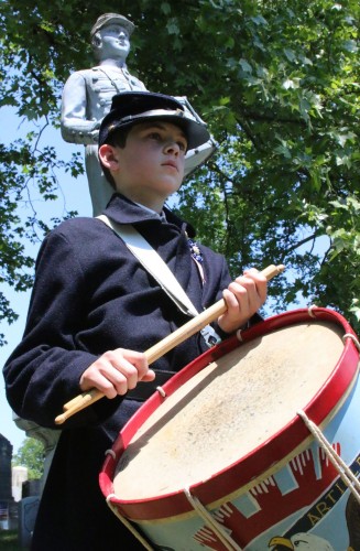 Drummer Boy Steven Badamo stands next to the monument to "Our Drummer Boy" Clarence MacKenzie. Steven is 11 years old and, remarkably, just got a drum two weeks ago. Clarence was 12 when he was killed in Maryland.