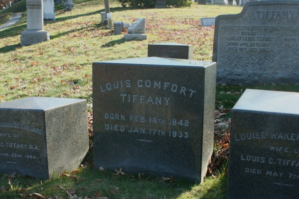 I have long found these stones fascinating. Louis Comfort Tiffany, the famous stained glass artist and designer, buried his first wife and second wife here. He was alive when their monuments were placed here. I find it inconceivable that he did not give Sharkey the design for their gravestones. It is simple yet refined--the shaping of the tops, as well as the thickness of the granite, is unusual for a gravestone. And, as is also characteristic of Tiffany's work, it is of the finest material--here a black granite with white highlights, a stone I have seen in only one other cemetery.