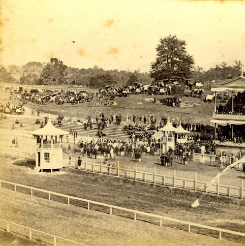 "Judges and Pooling Stand, Front View." Published by E. & H.T. Anthony & Co. A good view of the crowd.