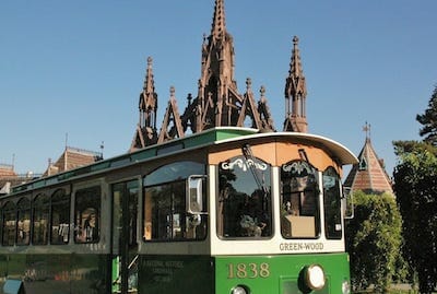 green-wood trolley and front gates photo