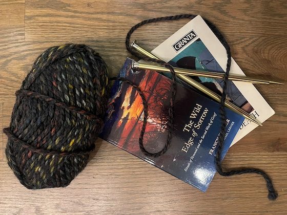 yarn, needle, reading material